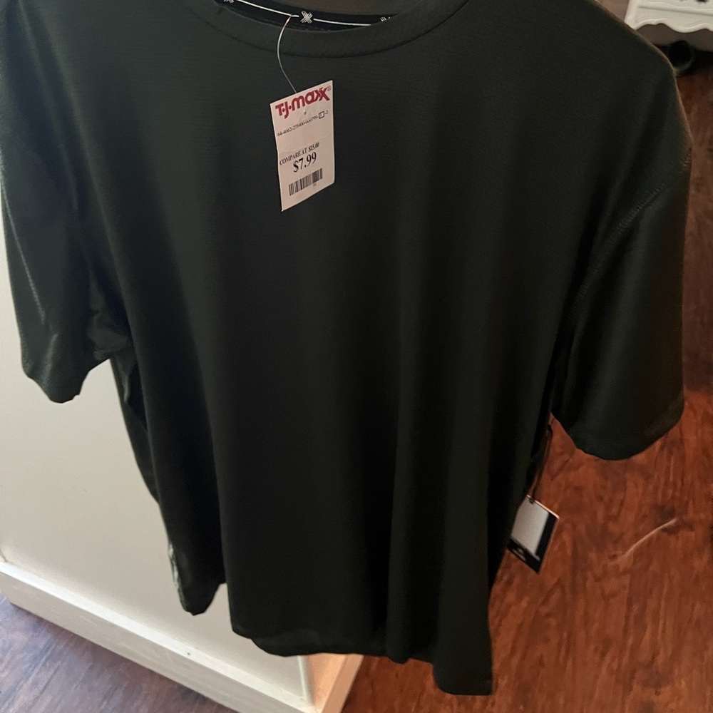 Kenneth Cole men’s active green short sleeve shirt.